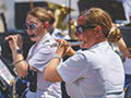  Two U.S. Army National Guard Members Play Flute at concert.